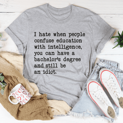 Don't Confuse Education With Intelligent Tee