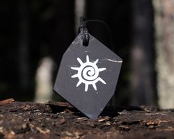 spiral sun pendant made of shungite