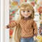 doll in fashionable sweatshirt