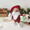 Santa Claus in home clothes cozy Christmas gift.jpg