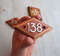 wooden address number sign 138