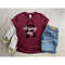MR-3052023142132-this-is-a-cotton-or-cotton-polyester-mix-shirt-the-shirt-has-a-closing-day-design-the-color-is-maroon.jpg