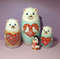 A cute matryoshka doll in the shape of bears and a cute penguin  (21).jpg