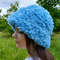 Curly faux fur hat in a blue. Festival fuzzy hat. Cute bucket hat.