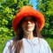 Bright orange bucket hat made of faux fur. Festival fuzzy hat. Cute orange fluffy hat.