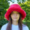 Red ruby faux fur bucket hat. Stylish fluffy hat for festivals and every day.