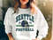 Seattle Seahawks Crewneck Sweatshirt, Vintage Retro Style Football Shirt.jpg