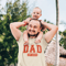 t-shirt-mockup-of-a-dad-carrying-his-baby-on-his-shoulders-m7699-r-el2.png