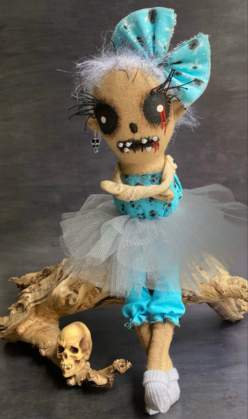 Halloween doll in blue dress