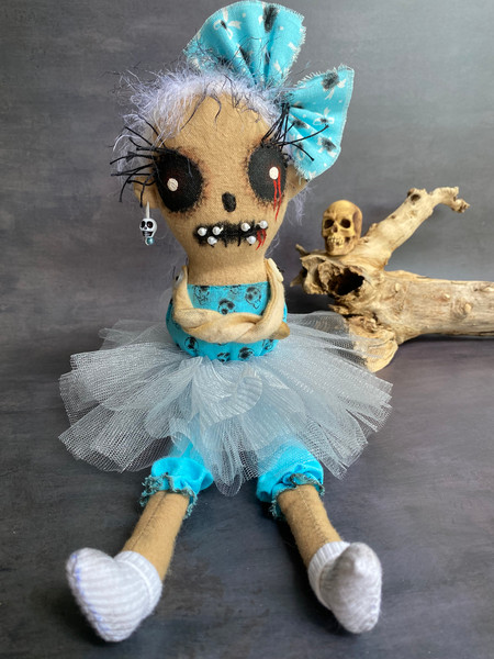 Halloween doll in blue dress