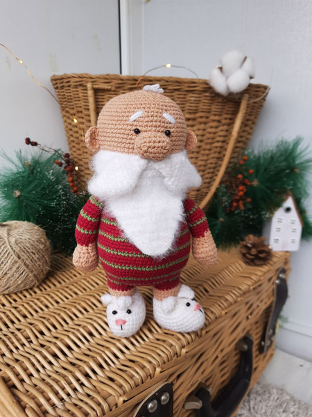 Santa Claus in home clothes cozy Christmas gift.jpg