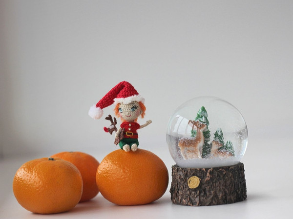 Christmas-miniature-elf-with-christmas-deer-rudolf.jpg