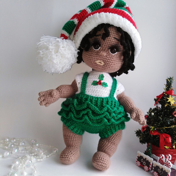 clothes christmas on doll.jpg