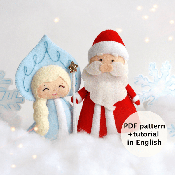 Felt Snow maiden and grandfather Frost toys against the background of snowflakes