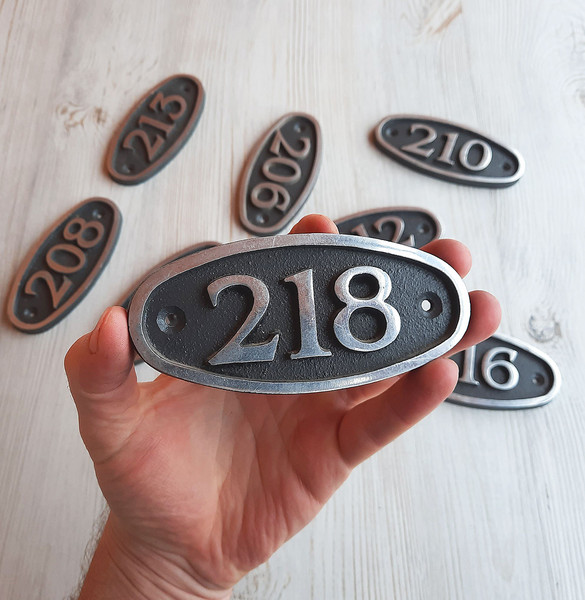 218 apartment number sign vintage