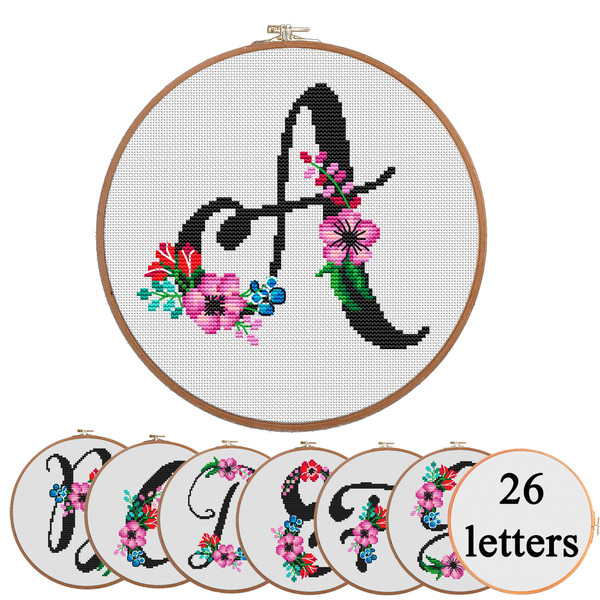 Cross stitch alphabet, letter a with flowers, canvas aida fabrick and round hoop.jpg