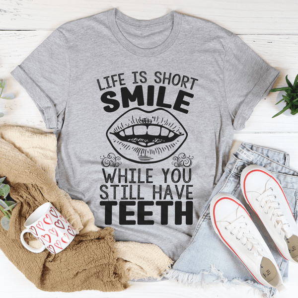 life-is-short-smile-while-you-still-have-teeth-tee-athletic-heather-s-peachy-sunday-t-shirt.png