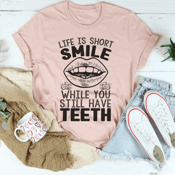 life-is-short-smile-while-you-still-have-teeth-tee-heather-prism-peach-s-peachy-sunday-t-shirt.png