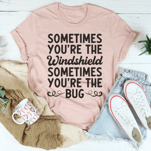 sometimes-you-re-the-windshield-sometimes-you-re-the-bug-tee-heather-prism-peach-s-peachy-sunday-t-shirt