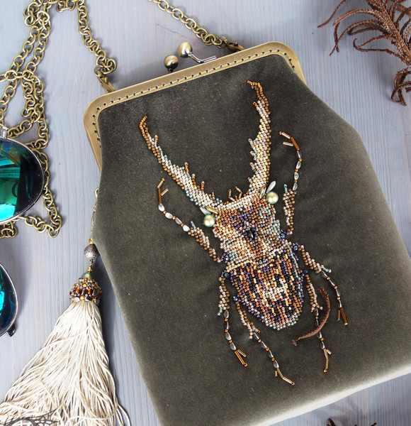 Golden grey beaded velvet bag with golden stag beetle.jpg