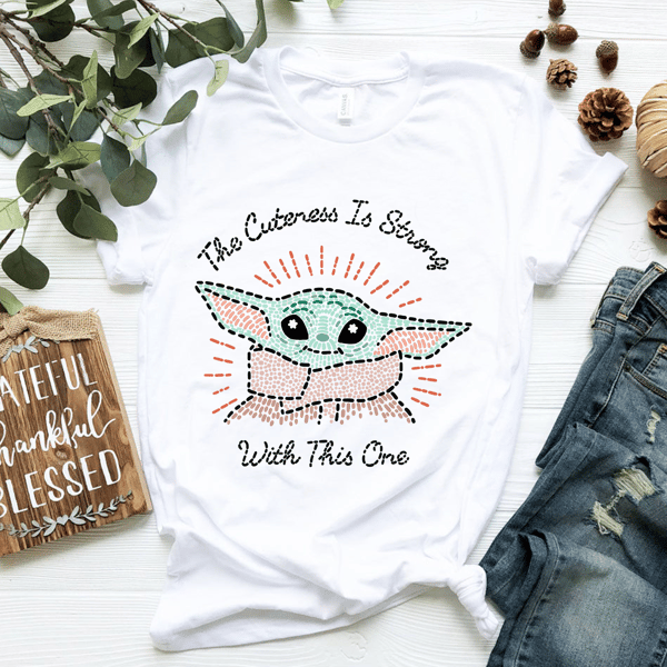 Star Wars The Mandalorian The Child Cuteness Is Strong T-Shirt.png