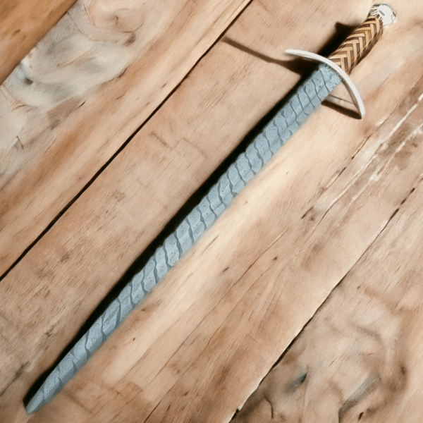Hand-Forged-Norse-&-Celtic-Fusion-A-Damascus-Steel-Viking-Sword-Masterpiece,Norse-mythology,Viking-culture (3).jpg