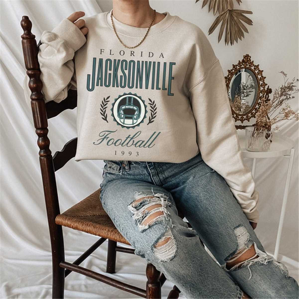 MR-1152023145828-jacksonville-football-retro-crewneck-sweatshirt-vintage-jax-sand.jpg