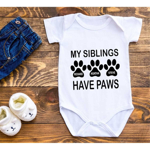 MR-135202313349-my-siblings-have-paws-pregnancy-announcement-baby-bodysuit-image-1.jpg