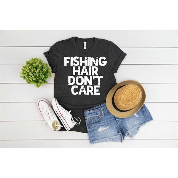 https://www.inspireuplift.com/resizer/?image=https://cdn.inspireuplift.com/uploads/images/seller_products/1685369372_MR-295202321850-fishing-hair-dont-care-shirt-fishing-shirt-girls-that-image-1.jpg&width=600&height=600&quality=90&format=auto&fit=pad