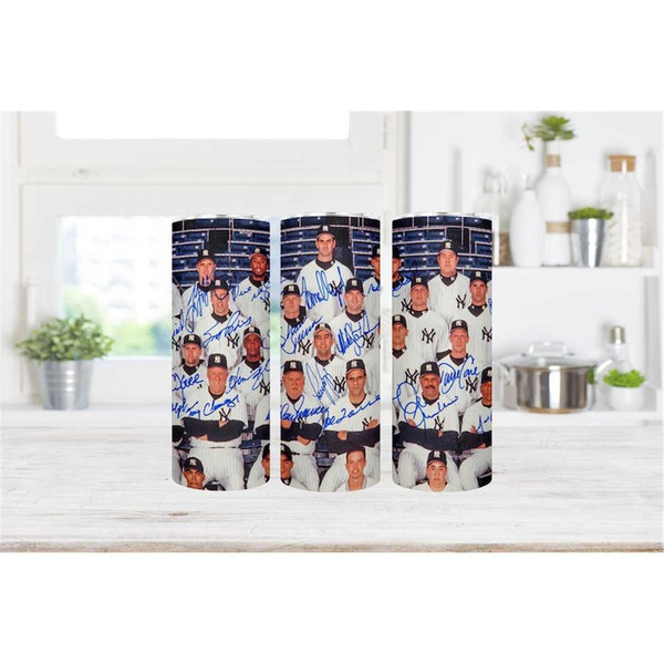 https://www.inspireuplift.com/resizer/?image=https://cdn.inspireuplift.com/uploads/images/seller_products/1685614640_MR-162023171718-tumbler-wrap-for-new-york-yankees-1998-yankees-20oz-image-1.jpg&width=600&height=600&quality=90&format=auto&fit=pad