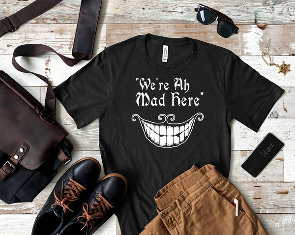 Were All Mad Here Shirt, Were All Mad Here T Shirt, We All A Little Mad Here Quote T Shirt, We All Mad Here Movie T Shirt.Jpg