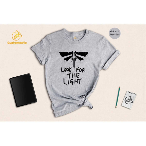 MR-1462023145355-look-for-the-light-shirt-the-last-of-us-tee-fireflies-image-1.jpg