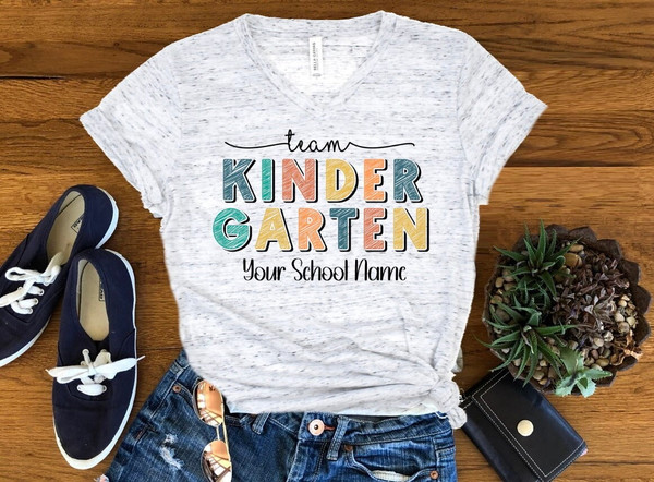 Team Kindegarten Personalized Tee, Back To School Teacher Shirt, Kindergarten Teacher Unisex V Neck Graphic Tee T-Shirt - 1.jpg