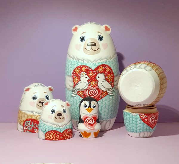 A cute matryoshka doll in the shape of bears and a cute penguin  (12).jpg