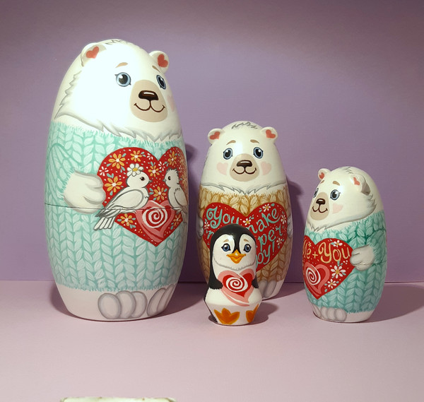 A cute matryoshka doll in the shape of bears and a cute penguin  (20).jpg