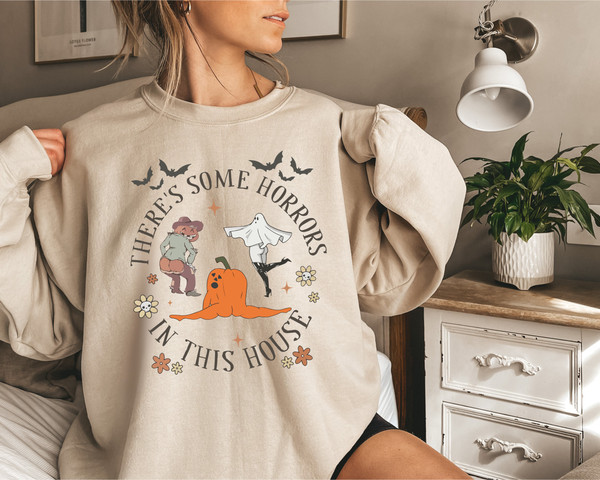 There's Some Horror In This House Funny Halloween Sweatshirt, Retro Halloween Autumn Spooky Season T-Shirt, Scary Pumpkin Fall Hoodie - 1.jpg