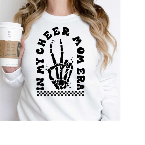 MR-2892023193325-in-my-cheer-mom-era-cheerleading-svg-cheer-mom-shirt-svg-image-1.jpg