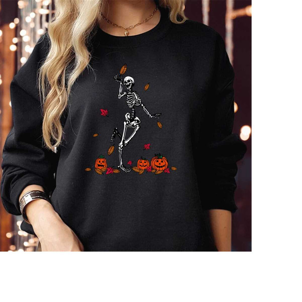 MR-3102023979-sweatshirt-1837-skeleton-dancing-pumpkin-leaves-spooky-black-sweatshirt.jpg