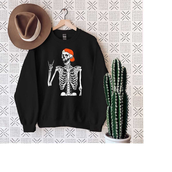 MR-3102023113333-rock-on-skeleton-hand-sweater-halloween-spooky-sweatshirt-image-1.jpg