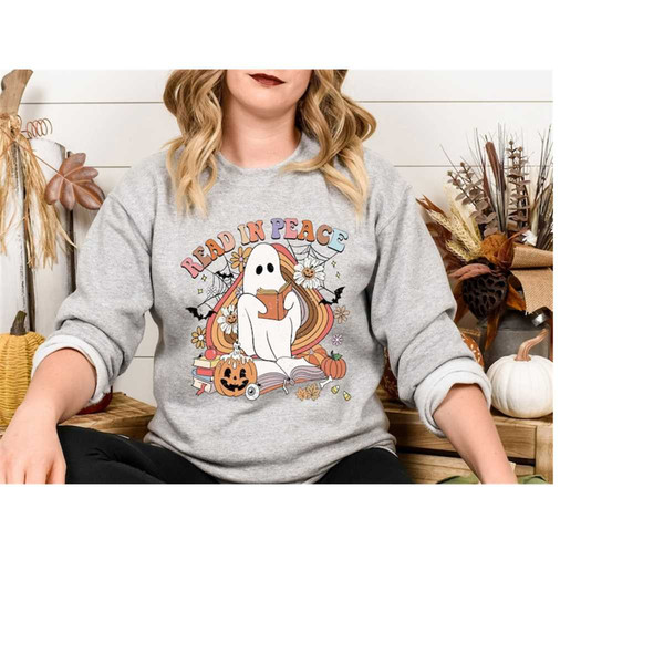 MR-4102023932-read-in-peace-sweatshirt-halloween-book-lover-sweatshirt-image-1.jpg