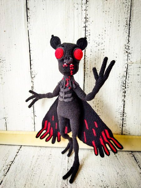 Finished Mothman just in time for Halloween 🎃 pattern from the book in the  background : r/Amigurumi