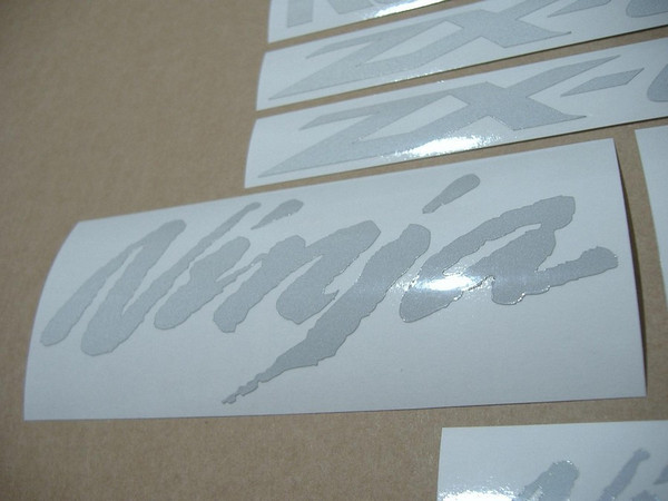 Kawasaki-zx6r-reflective-white-adhesive-emblems.JPG