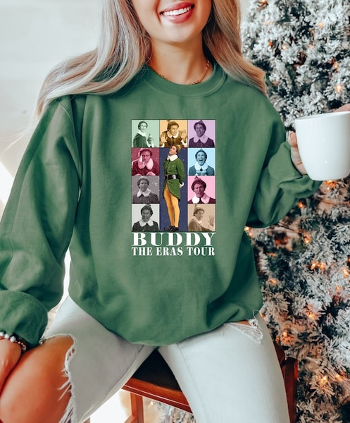 Buddy The Era Tour Sweatshirt, Christmas Elf Sweater, TS Era Tour Elf Shirt, Christmas Crewneck, Xmas Tee, Christmas Gift, Elf Concert Shirt.jpg