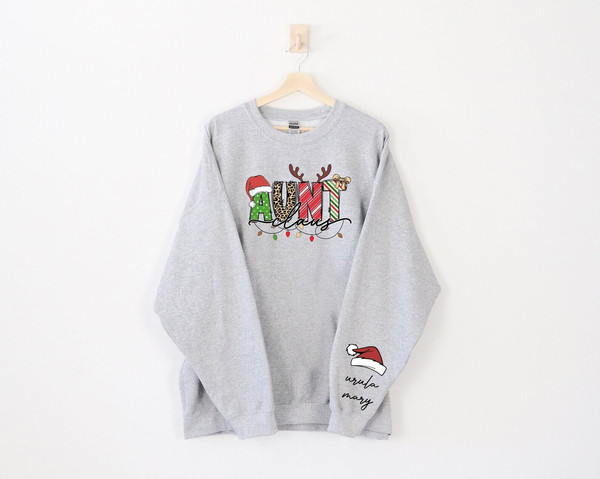 Groovy Custom Aunt Claus Christmas Lights Crewneck Sweatshirt Gift From Niece& Nephew,Christmas Aunt Hoodie,Funny Aunt Shirt,Cute Auntie Tee.jpg