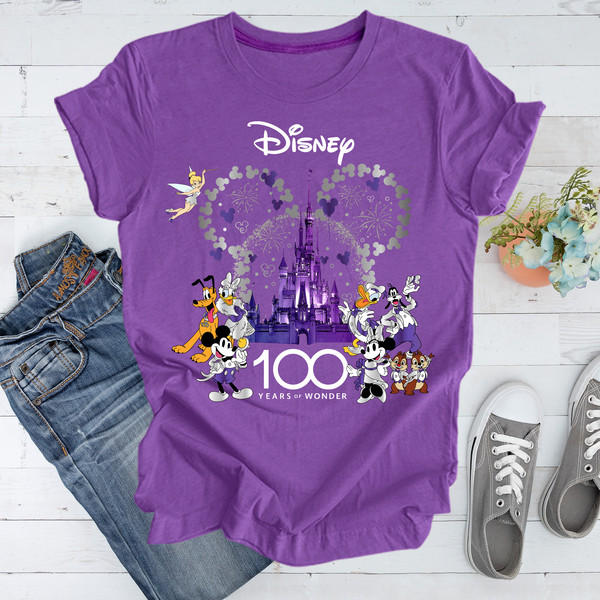 Celebrate 100 Years Of Disney Wonder With This Magical Shirt Disney 100 Years Of Wonder T-Shirt With Disney Characters Disney Couple Tees.jpg