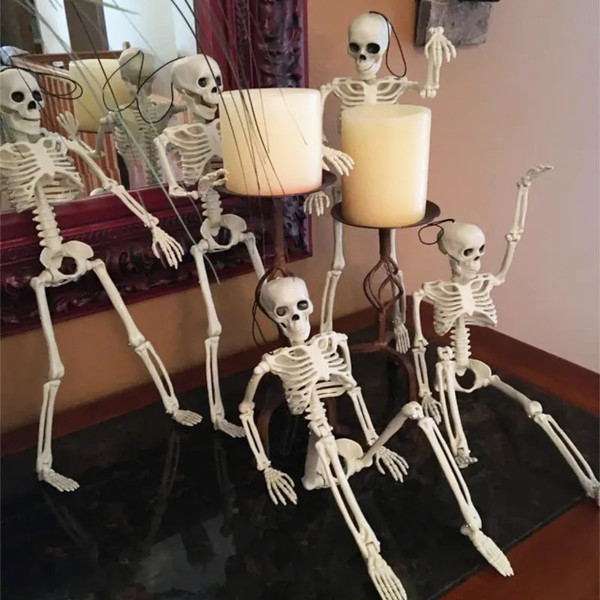 GwPTSkeleton-Halloween-Decorations-40cm-Posable-Funny-Lifelike-Plastic-Skeletons-for-Haunted-House-Graveyard-Scene-Party-Props.jpg