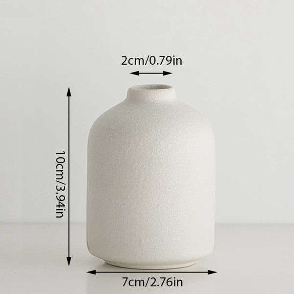 pzGQWhite-Mini-Ceramics-Vase-Simple-Nordic-Creative-Flower-Vase-Home-Living-Room-Table-Flower-Bottle-Crafts.jpg