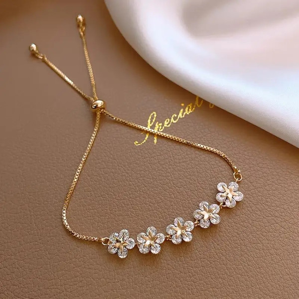 Fgr5Elegant-Inlaid-Rhinestone-Korean-Bracelets-Gold-Colour-Flower-Charm-Bracelet-for-Women-Fashion-Jewelry-Accessories-Party.jpg