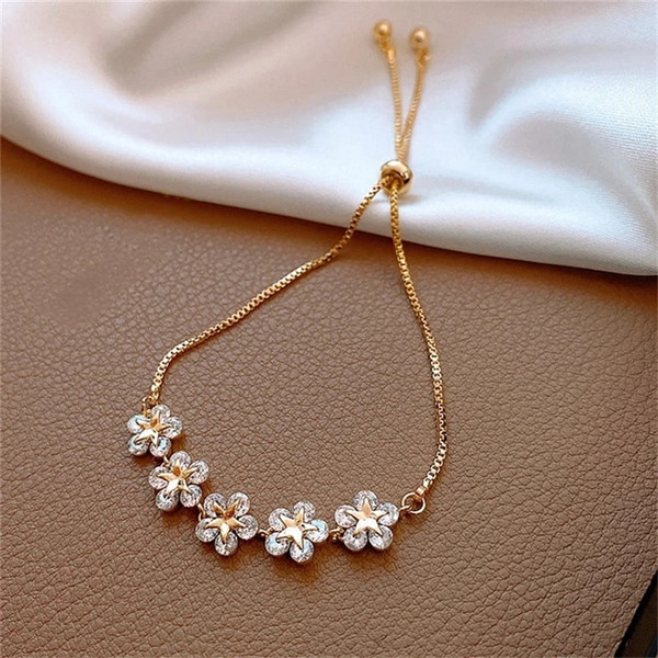 eqSBElegant-Inlaid-Rhinestone-Korean-Bracelets-Gold-Colour-Flower-Charm-Bracelet-for-Women-Fashion-Jewelry-Accessories-Party.jpg