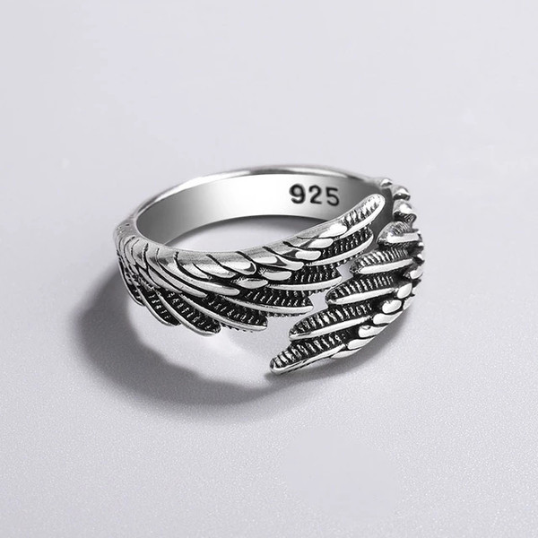 UoKu925-Sterling-Silver-Rings-Fashion-Hip-Hop-Vintage-Couples-Creative-Wings-Design-Thai-Silver-Party-Jewelry.jpg